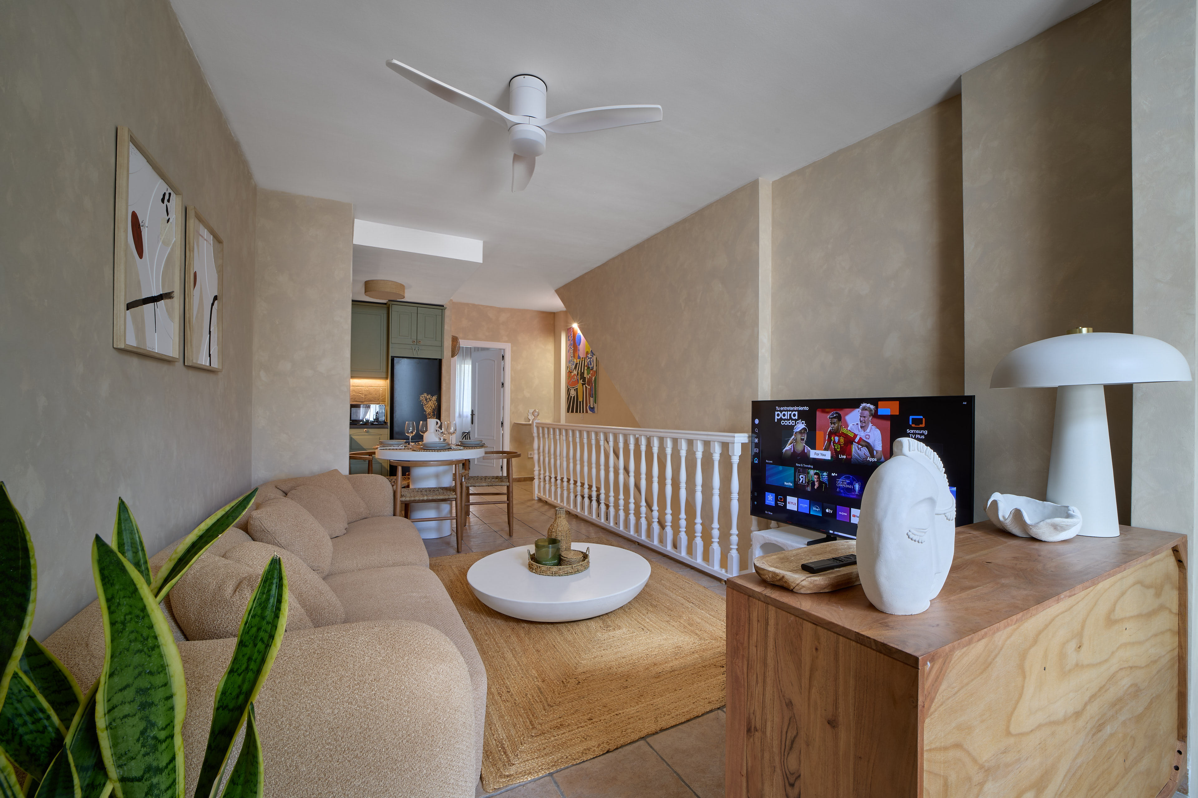 Bright neutral living room at Casa Wanda with natural textures