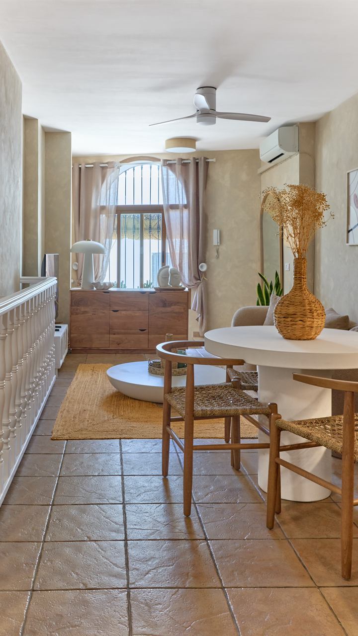 Warm living and dining area at Casa Wanda, used as a preview for the video tour